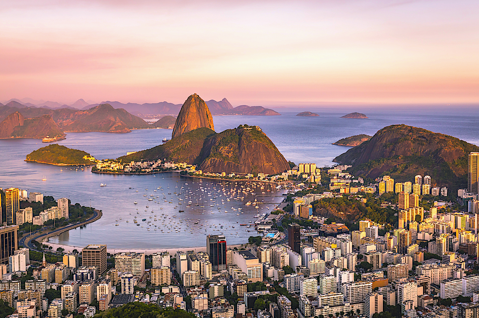 Sugarloaf Mountain (access via cable car) rises 400 meters over Rio de Janeiro